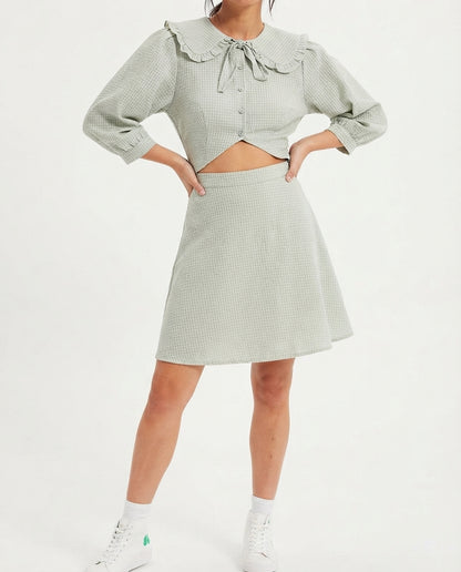 Dress with mint-colored details