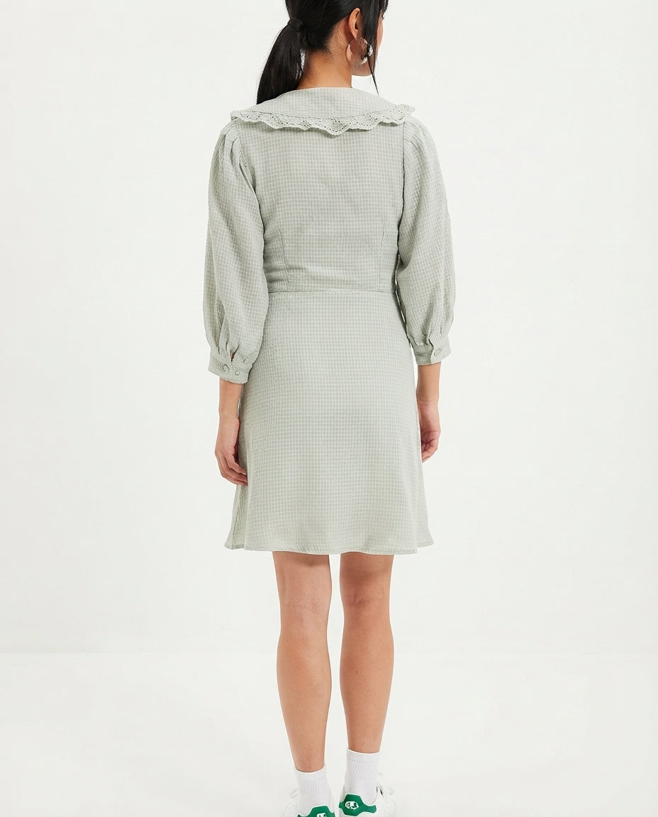 Dress with mint-colored details