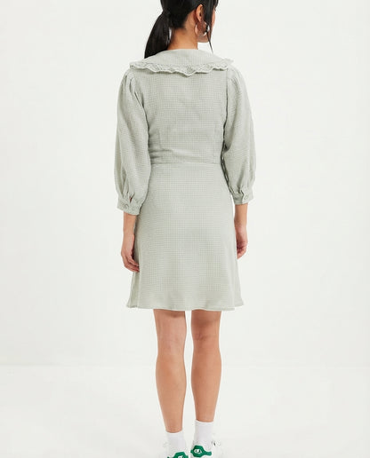 Dress with mint-colored details