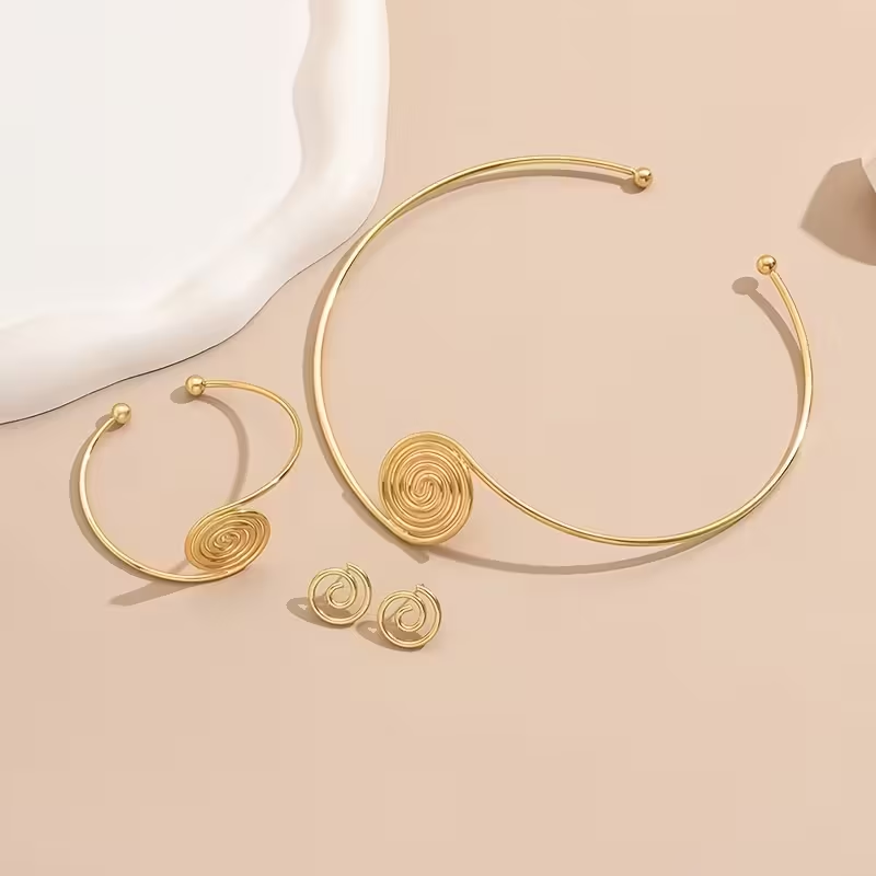 Golden Set of 4pcs Elegant Earrings, Bracelet, and Necklace.